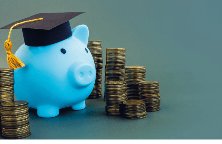 Savings for college  Piggy bank with graduation cap 