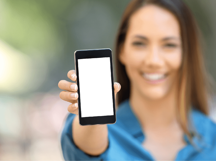 Girl hand showing a phone screen mock up on the street