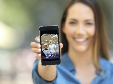 Girl hand showing a phone screen mock up on the street