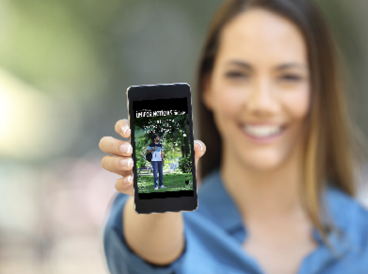 Girl hand showing a phone screen mock up on the street