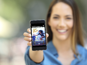 Girl hand showing a phone screen mock up on the street