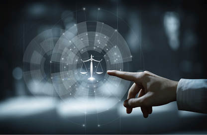 Hand clicks on scales of justice. Concepts of legal services and justice.