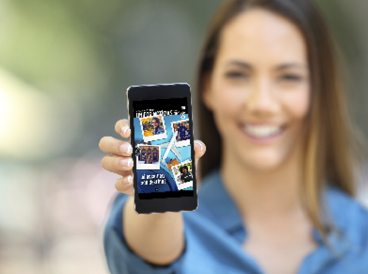 Girl hand showing a phone screen mock up on the street