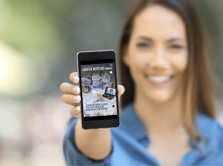 Girl hand showing a phone screen mock up on the street