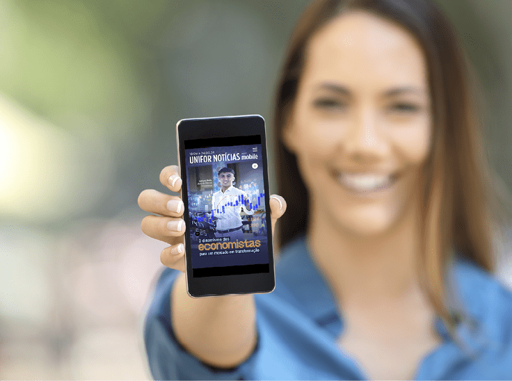 Girl hand showing a phone screen mock up on the street