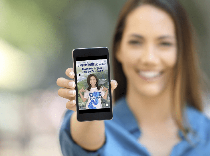 Girl hand showing a phone screen mock up on the street