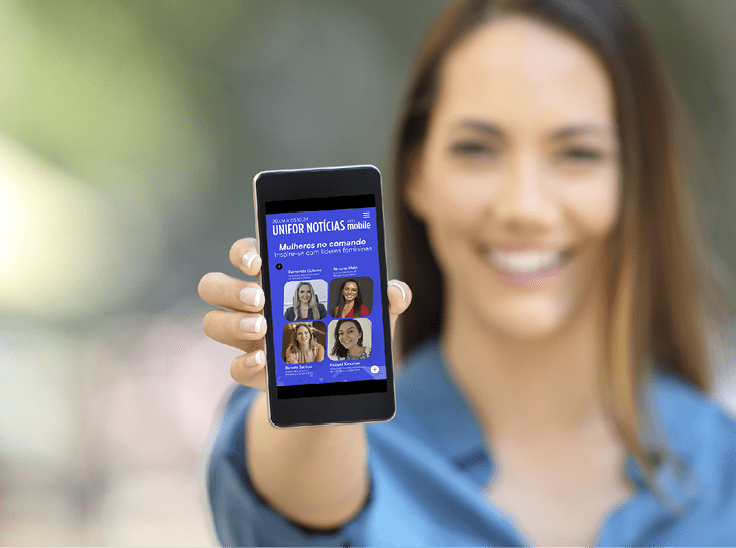 Girl hand showing a phone screen mock up on the street