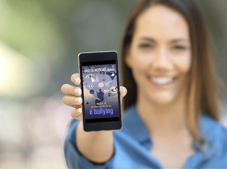 Girl hand showing a phone screen mock up on the street