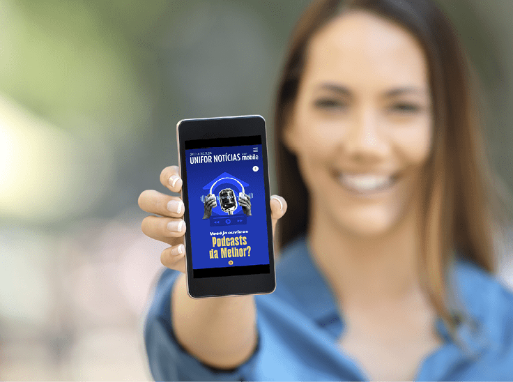 Girl hand showing a phone screen mock up on the street