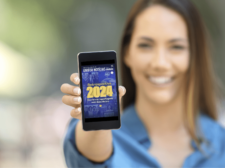 Girl hand showing a phone screen mock up on the street