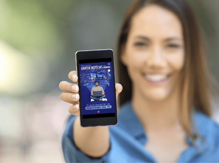 Girl hand showing a phone screen mock up on the street