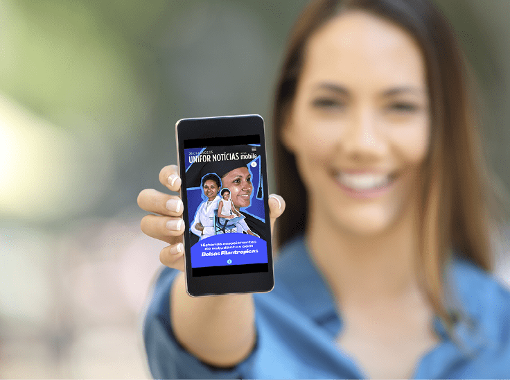 Girl hand showing a phone screen mock up on the street