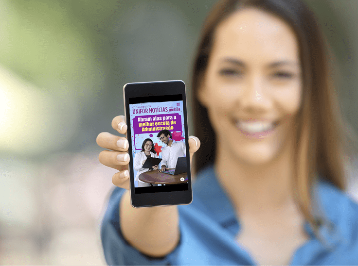 Girl hand showing a phone screen mock up on the street