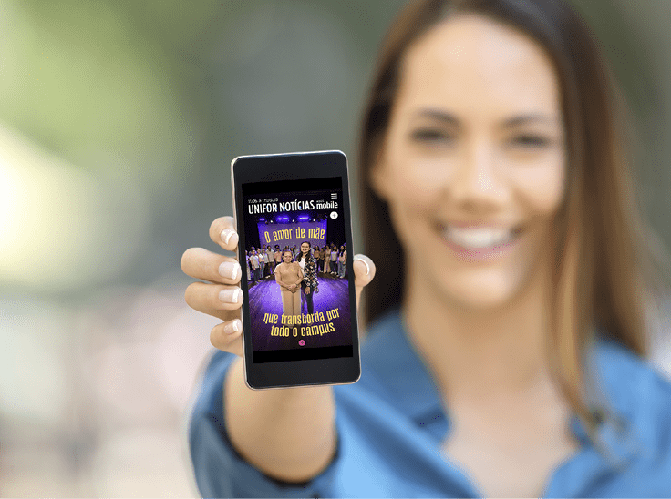 Girl hand showing a phone screen mock up on the street