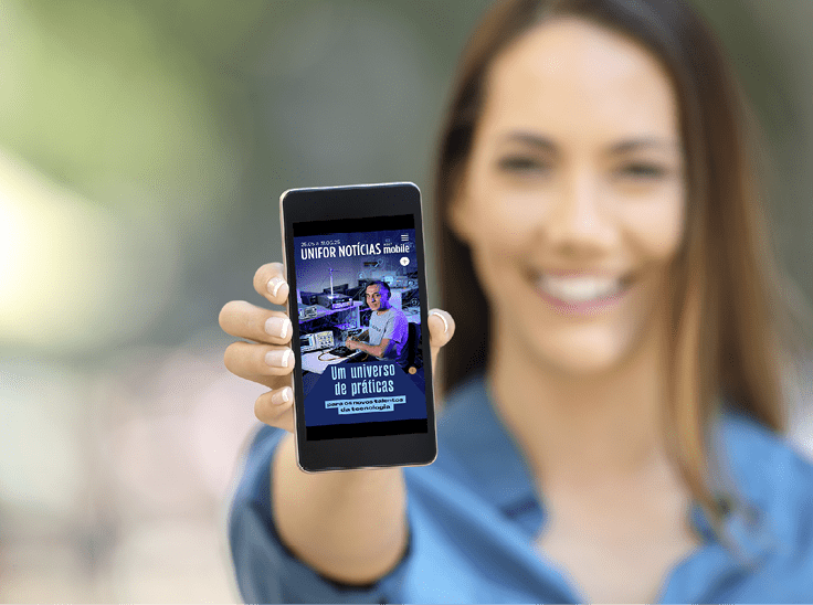 Girl hand showing a phone screen mock up on the street