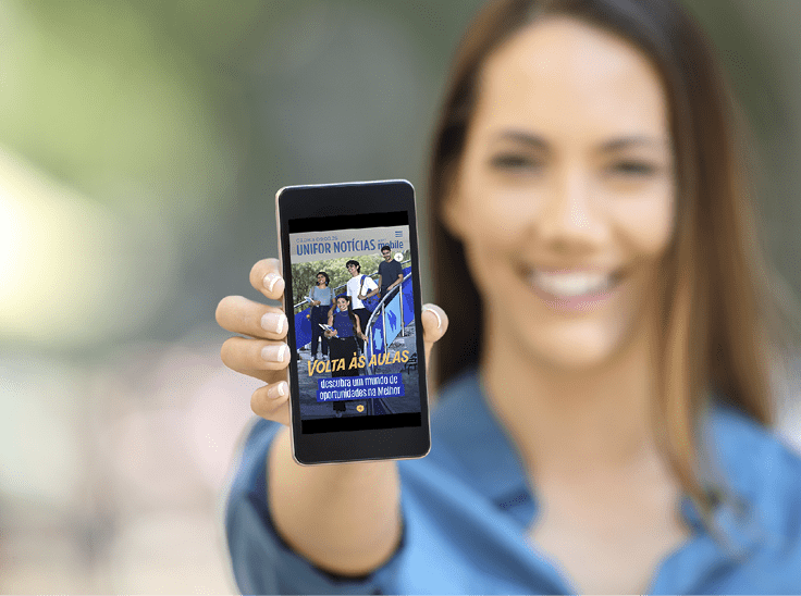 Girl hand showing a phone screen mock up on the street