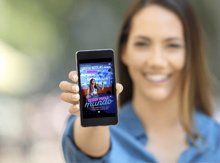 Girl hand showing a phone screen mock up on the street