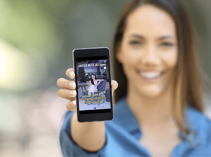 Girl hand showing a phone screen mock up on the street