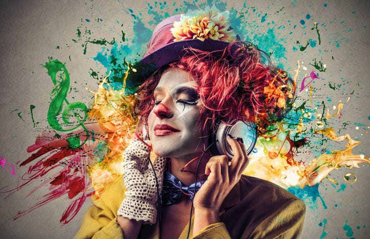 Woman dressed as a colorful clown listening to music with colorful illustrations