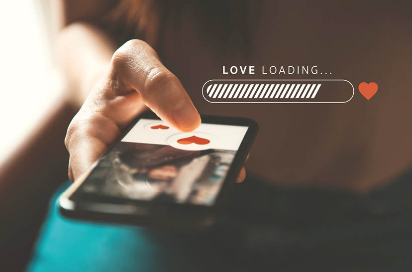 Love loading progress, Finger of woman pushing heart icon on screen in mobile smartphone application  Online dating app, valentine's day concept 