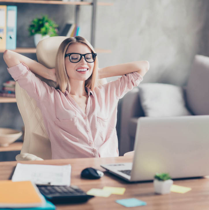 Stylish, pretty, charming, nice economist resting on chair with close eyes at desk in work place, having hands behind the head, dreaming, thinking about holidays, imagine vacation