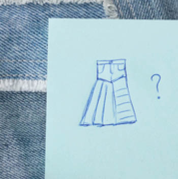 Old jeans ready to upcycling and pattern,  made from old jeans pieces, pen and note paper  Concept of things reuse and natural resources preserving 