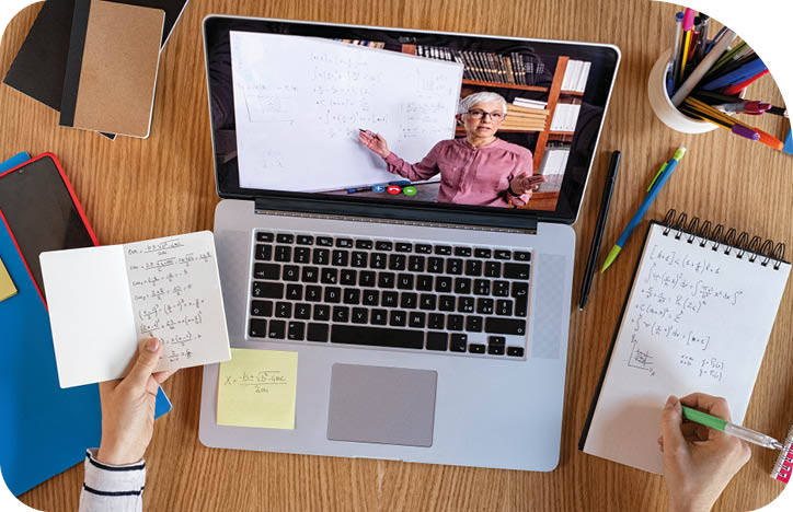High angle view of video conference with teacher on laptop at home  College student learning maths while watching online webinar, listening audio course  Top view of girl in video call with personal tutor on computer, distance and e-learning education concept 