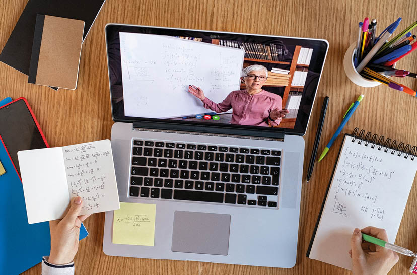 High angle view of video conference with teacher on laptop at home  College student learning maths while watching online webinar, listening audio course  Top view of girl in video call with personal tutor on computer, distance and e-learning education concept 