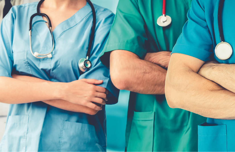 Doctor working in hospital to fight 2019 coronavirus disease or COVID-19  Professional healthcare people with other doctors, nurse and surgeon  Corona virus medical care and protection concept 