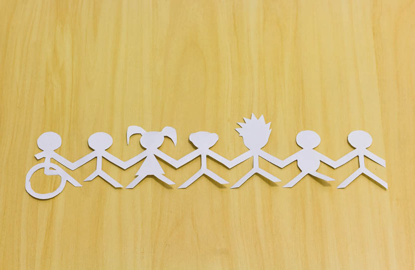 The image represents the union between different people, symbolizing social inclusion