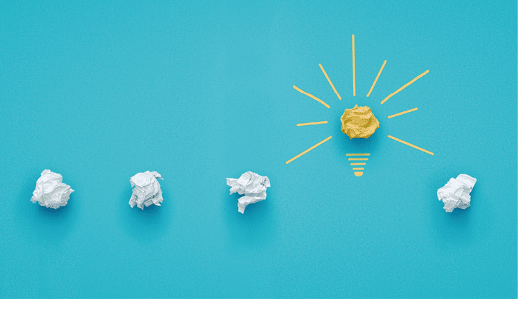Great idea concept  Crumpled paper light bulb over blue background with copy space