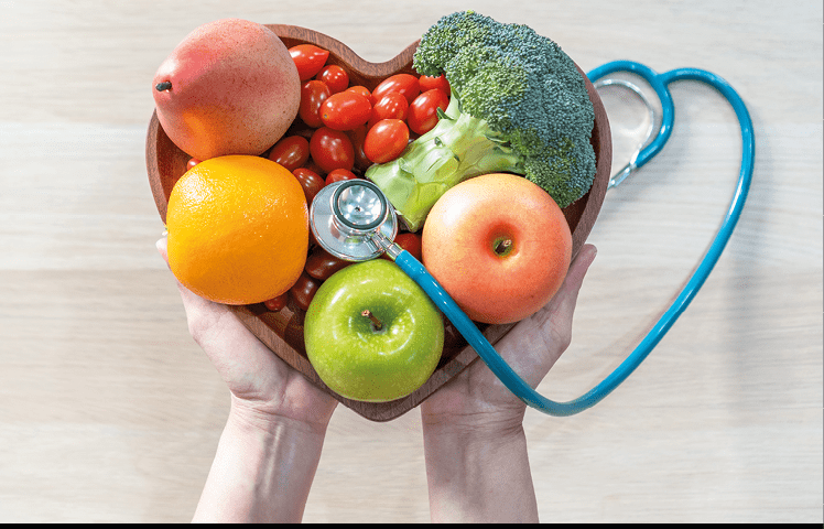 Nutritional food for heart health wellness by cholesterol diet and healthy nutrition eating with clean fruits and vegetables in heart dish by nutritionist and doctor recommended for patient well-being